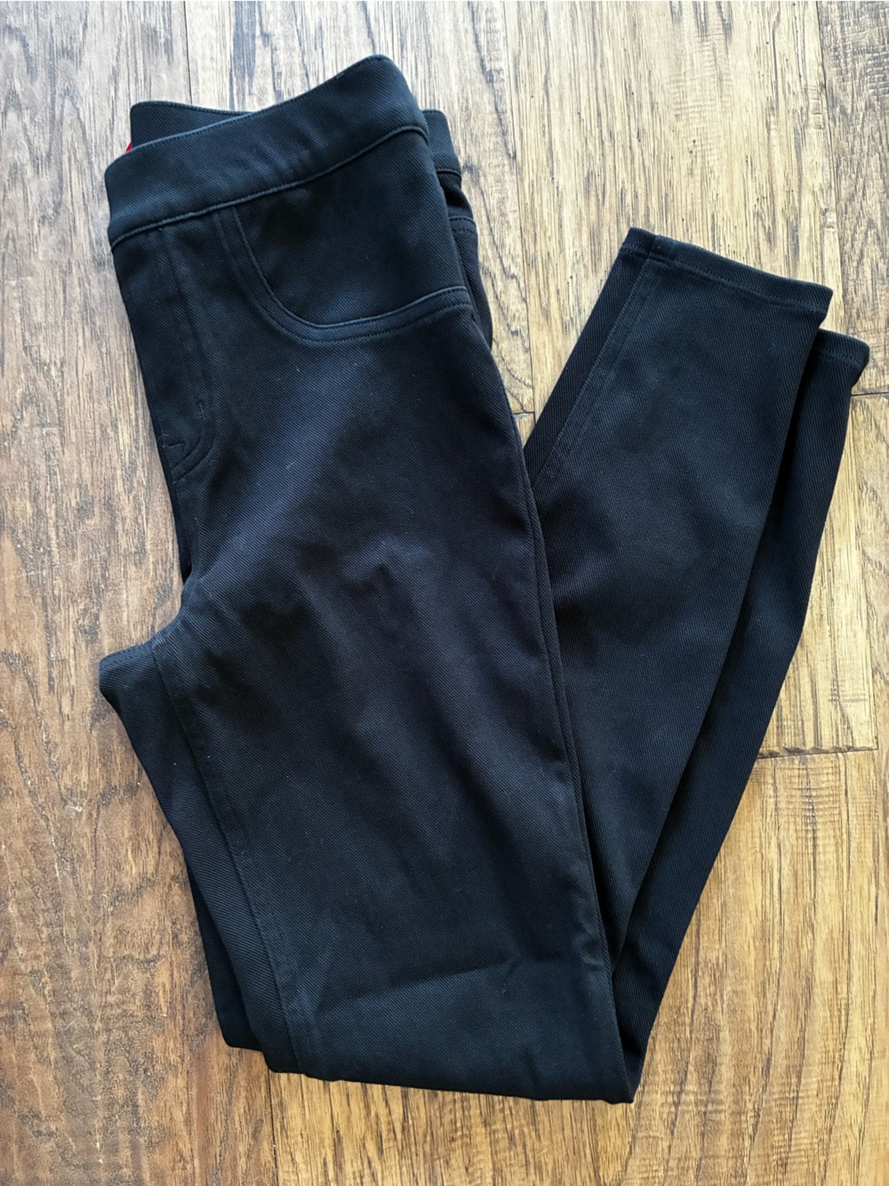 SPANX Black Jeggings with faux front pockets and useable back pockets